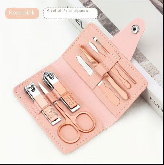 Rose pink manicure tool set with 7 nail clippers in a compact, portable case