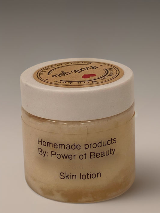 Homemade skin lotion in jar with Power of Beauty brand logo.